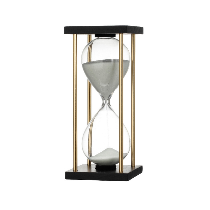 Trio of hourglass timers with serene white, vibrant teal, and earthy brown sands, each nestled in an elegant black and gold stand.
