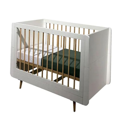 Sleek Love N Care Santorini Cot White set in a modern nursery, showcasing its elegant design