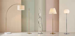 Range of luxury floor lamps in premium finishes on a pastel backdrop.