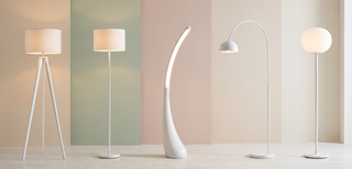 Range of white floor lamps in different styles on a pastel backdrop.
