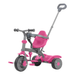 Child gleefully riding the Trike Star featuring a reversible seat and parent control handle