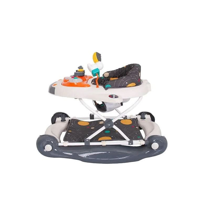 Toddler gleefully interacting with the space-themed play tray on the Love N Care Shuttle Walker