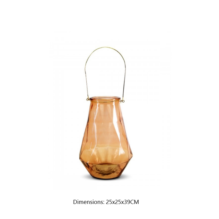 Reflection of candlelight on the sleek surface of the Paddington Glass Candle Holder in ivory.