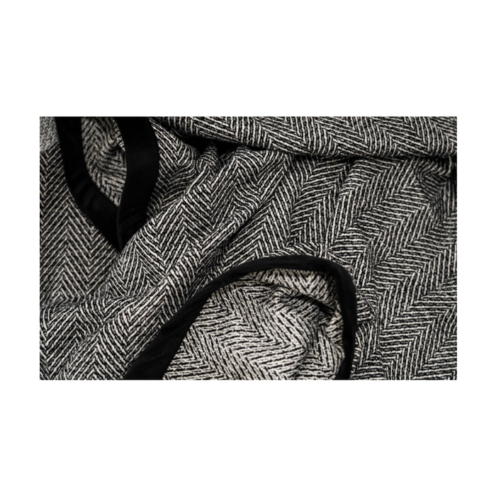 Close-up of the Monochrome Chic Throw showcasing its premium fabric and unique black border design