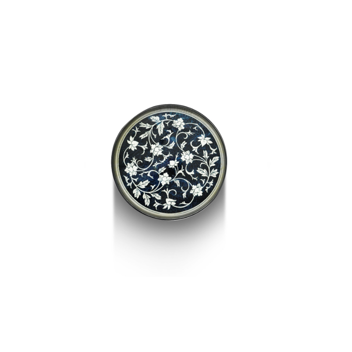 The Azure Elegance Round Tray displayed as a centrepiece in a modern living room setting