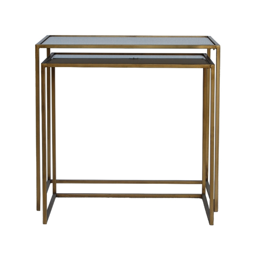 Close-up of Bella Nest Tables showcasing the mirrored finish and brass accents