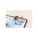 Baby engaged in play on the spacious Tiny Love Magical Tales Super Mat