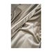 Artistic depiction of the Contrast Couture Throw's versatility in home styling