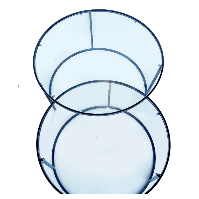 Charming Bella Round Black Nesting Coffee Table with reflective glass top enhances modern living spaces