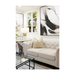 Sumptuous gold decorative pillow propped on a minimalist couch for a stylish contrast