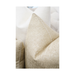 Opulent gold cushion adding a touch of elegance to a modern living room setup