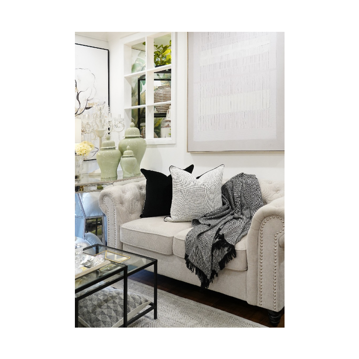 Luxurious and lightweight tassel throw in a neutral colour, perfect for home decor