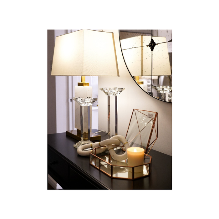 Chic rose gold glass tray accentuating a luxurious home decor setup