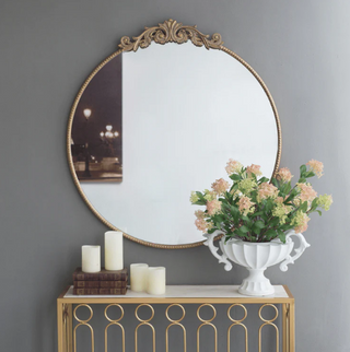 Arabella Victorian Golden Round Mirror on the wall