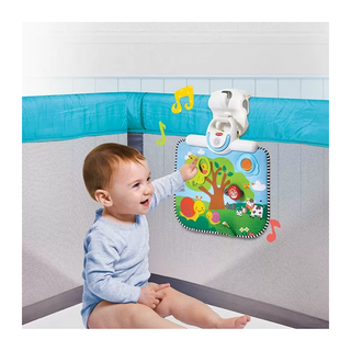 Baby playing with Tiny Love Double Sided Cot Baby Toy