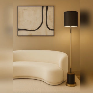 Bella Modern black floor lamp with Golden Accent in a Modern Lounge Room.