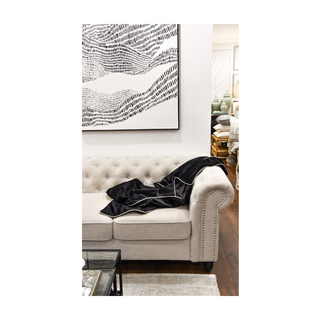 Black Double Sided with White Pipping Throw on Sofa