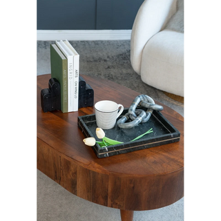 Black Marble Step Bookend Set on coffee table holding books