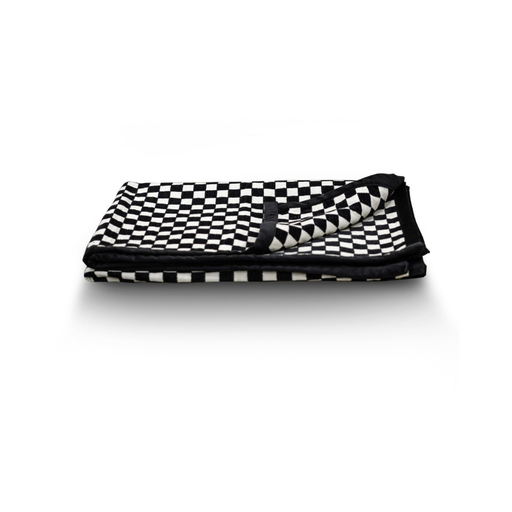 Close-up of the Checkmate Chic throw highlighting the detailed chessboard pattern