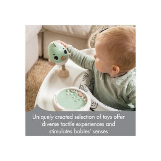 Child in Tiny Love 5-In-1 Black & White Stationary Activity Center 