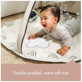 Close-up of a baby interacting with sensory textures on the Tiny Love Gymini
