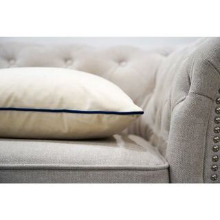 Eggshell Cushion with Navy Piping Close-up