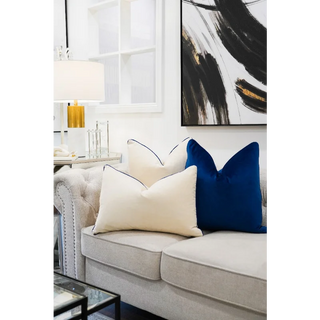 Eggshell Cushion with Navy Piping and Navy Cushions On Sofa