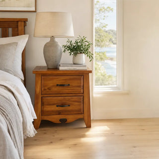 Federation 2-Drawer Bedside Table styled in a warm, sunlit coastal Australian bedroom.