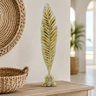 Gold Leaf Palm Frond Sculpture styled on an entryway console
