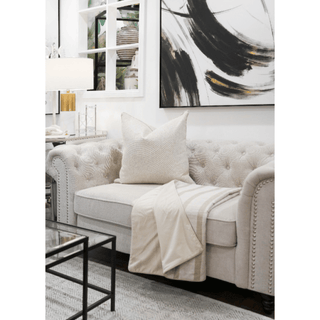 Gold and Beige Striped Throw on Sofa