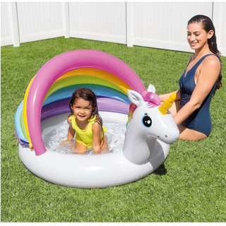 Kid playing in Intex Unicorn Baby Pool