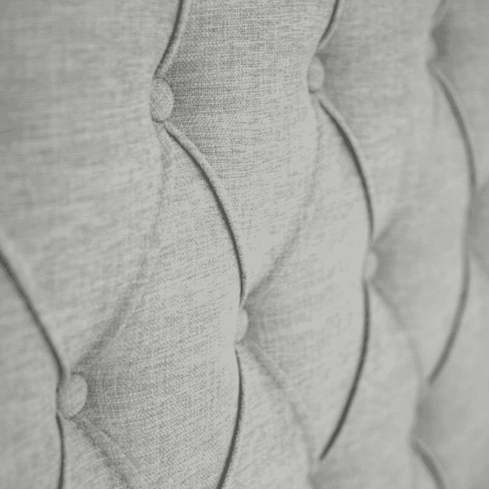 Close-up button tufting detail on Kingston fabric headboard stone colour