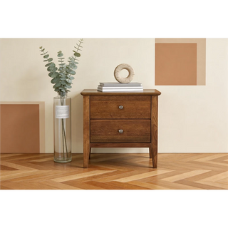 Marina 2-Drawer Bedside Table next to a vase