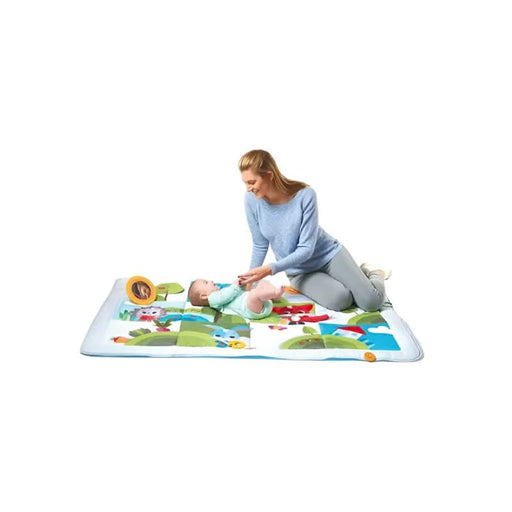 Mother and child playing on the Tiny Love Meadow Days Super Mat 