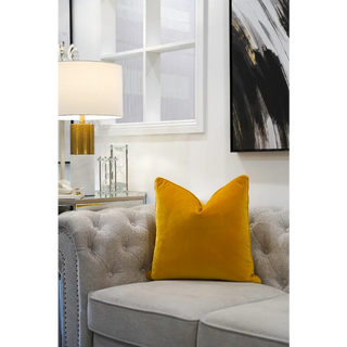 Saffron Velvet Cushion On Sofa