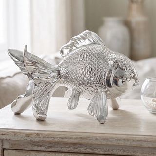 Silver Metallic Fish Figurine styled on a console table