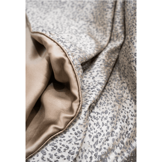 Speckled Cream and Tan Throw with Satin Trim Close-up