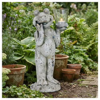 Weathered Stone Frog Candle Holder In the garden