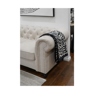 Zebra Black And White With Black Trim Throw on sofa side