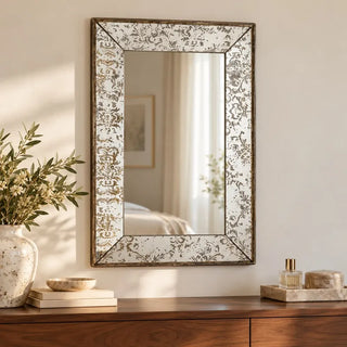 Antique style dual purpose tray mirror hung above walnut sideboard with olive branches