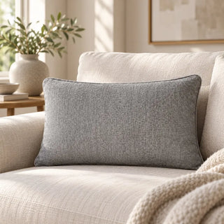  Charcoal grey weave cushion on cream sofa with knit throw