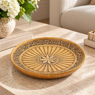 Lucina resin platter on speckled stone coffee table with white hydrangeas