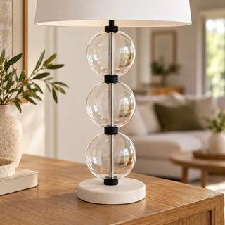 Marina sand glass lamp close up of clear orbs black connectors and off white base