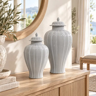 New port white jar 40cm and 61cm on oak sideboard beside round wooden mirror