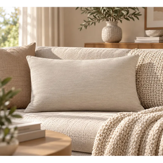 Oatmeal weave cushion rectangle on cream sofa with chunky knit throw