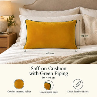 Saffron cushion with green piping size guide 40cm x 60cm on white linen bed