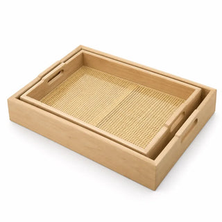 Set of 2 stackable wooden trays nested with woven cane bases on white background