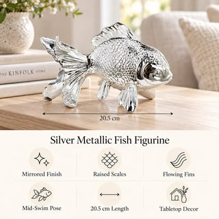 Silver metallic fish figurine 20.5cm length guide with feature icons on oak table