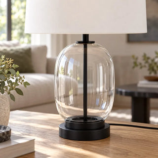 Soho glass lamp clear capsule body and black base close up in living room