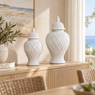 Textured ceramic diamond pattern vase two sizes on oak sideboard by ocean view window